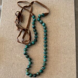 Elegant Green Beaded Necklace with Brown Leather Cord